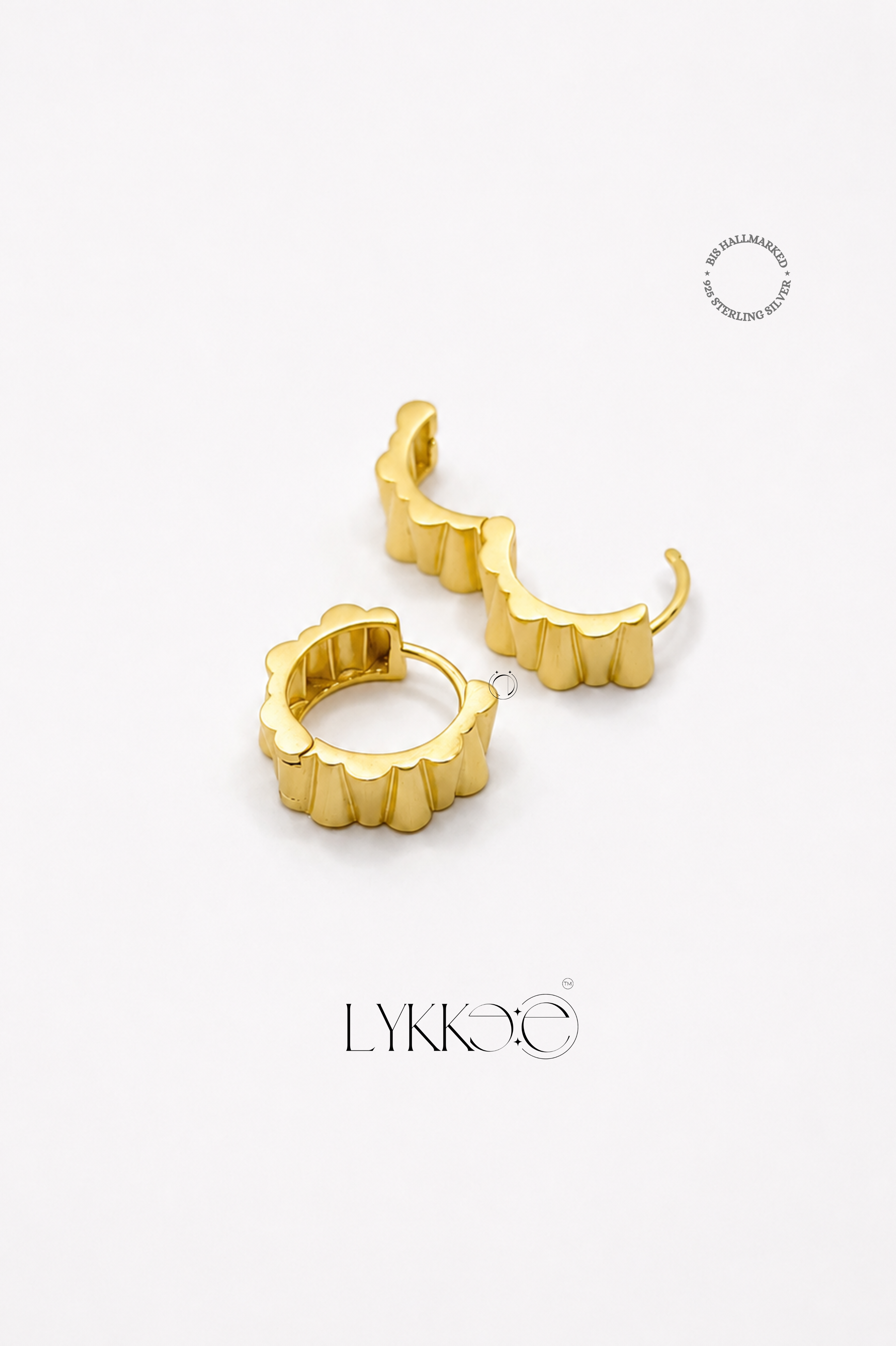 Radiant Edge Huggie Earrings