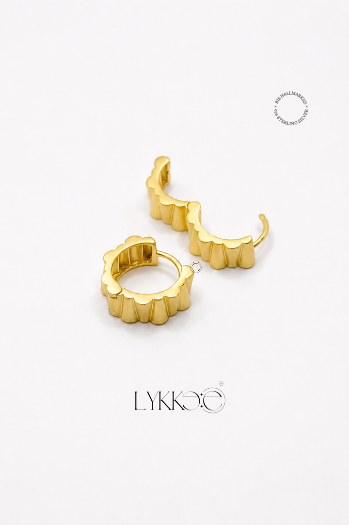 Radiant Edge Huggie Earrings