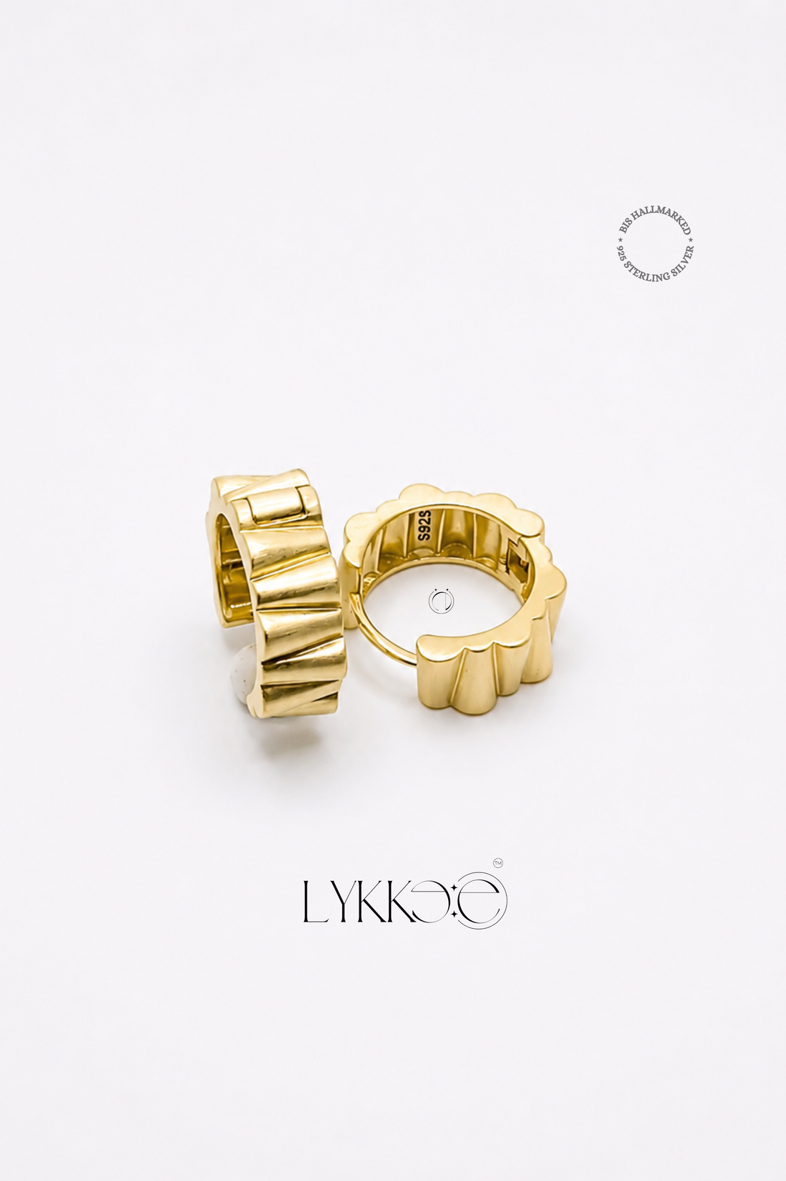 Radiant Edge Huggie Earrings