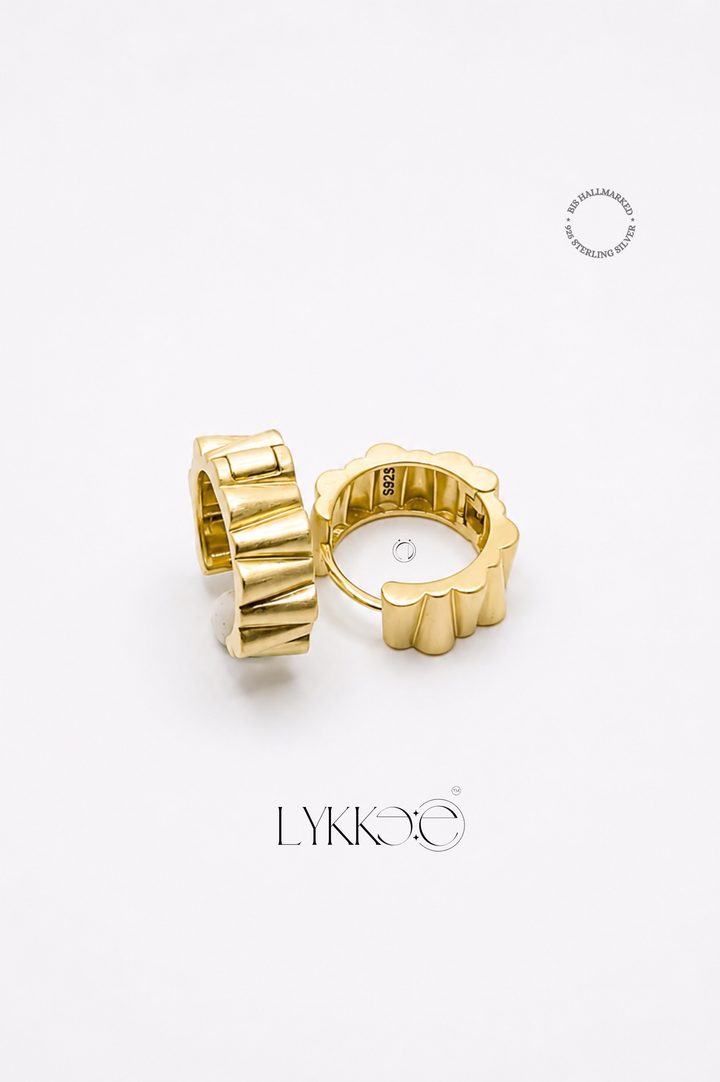 Radiant Edge Huggie Earrings